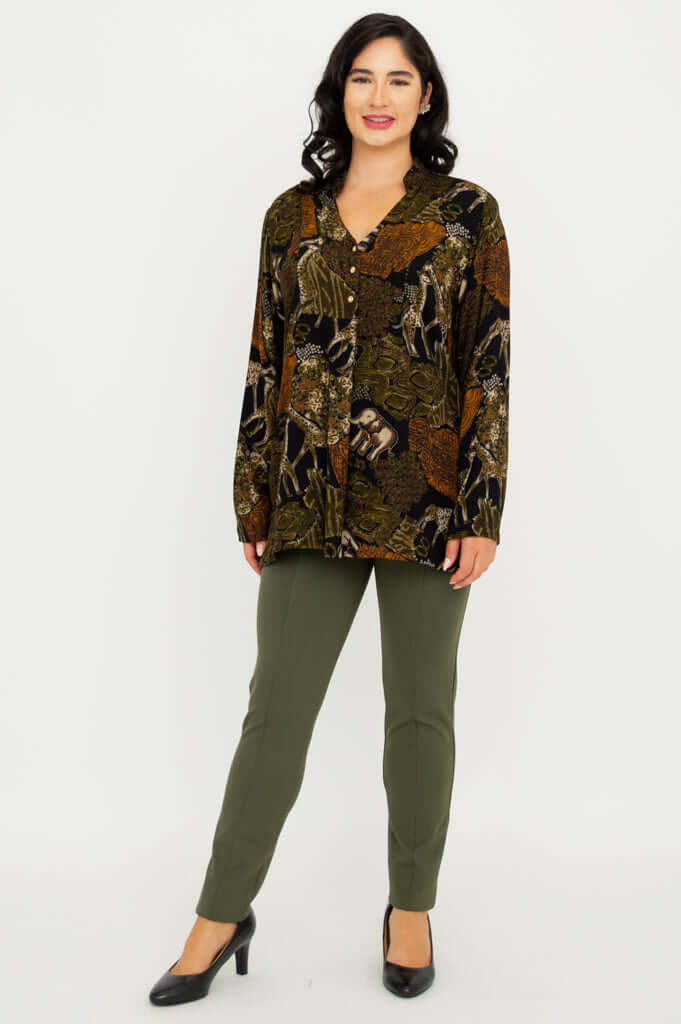 Full body view of model in Shirley Batik Art print top and green pants