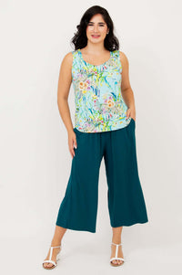 Full body frontal view of model in floral Ritzy Tank and teal wide-leg pants