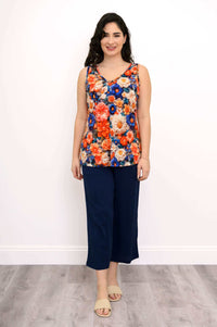 Full body front view of a woman modeling the floral bamboo tank top outfit