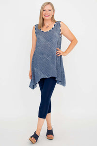 Full body front view of a woman modeling a navy stripe swing tank and navy leggings