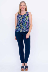 Full body view of woman in Dee Tank top and navy pants facing forward
