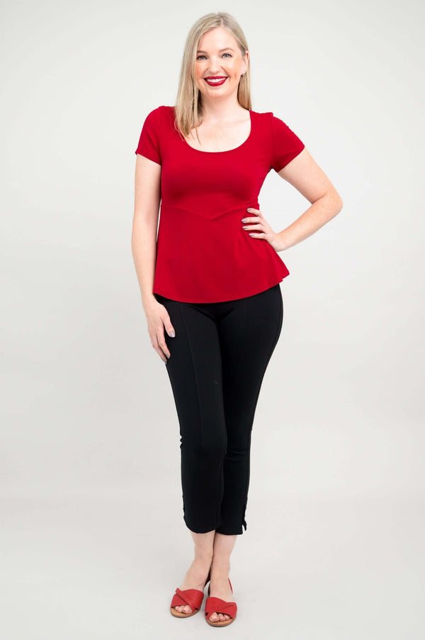 Full body front view of woman in Kim Cap bamboo top and black pants