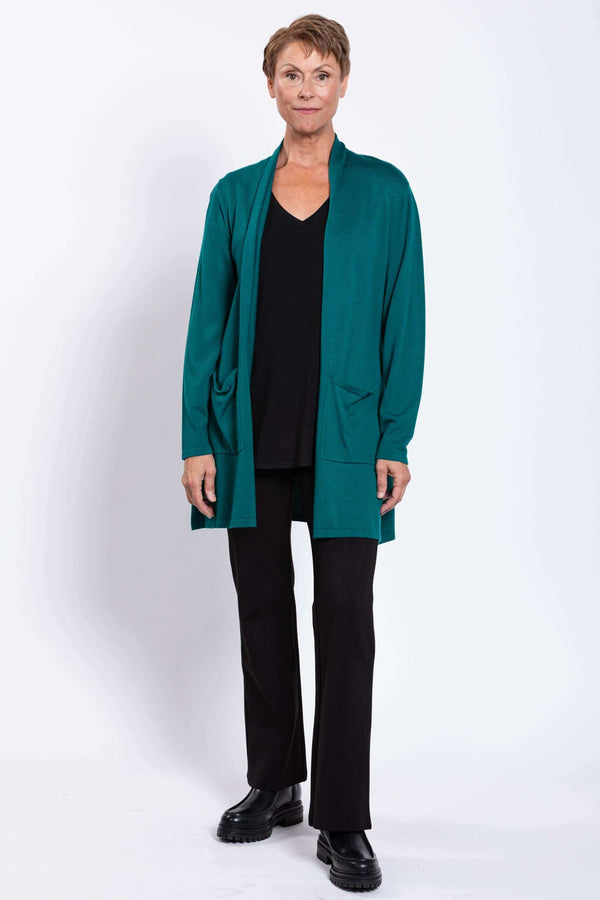 Full body view of woman modeling the teal Paige Sweater cardigan