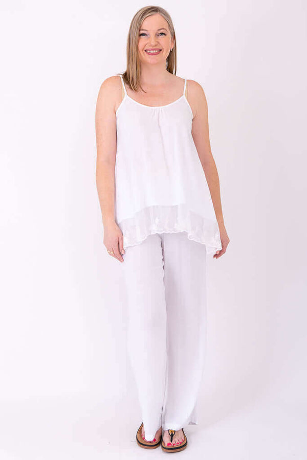Full body view of woman modeling white Chantilly Lace Tank and pants