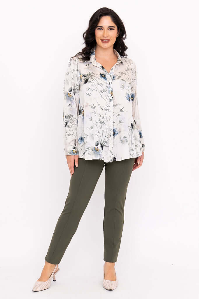 Full body view of woman modeling the Charlotte Blouse and green pants