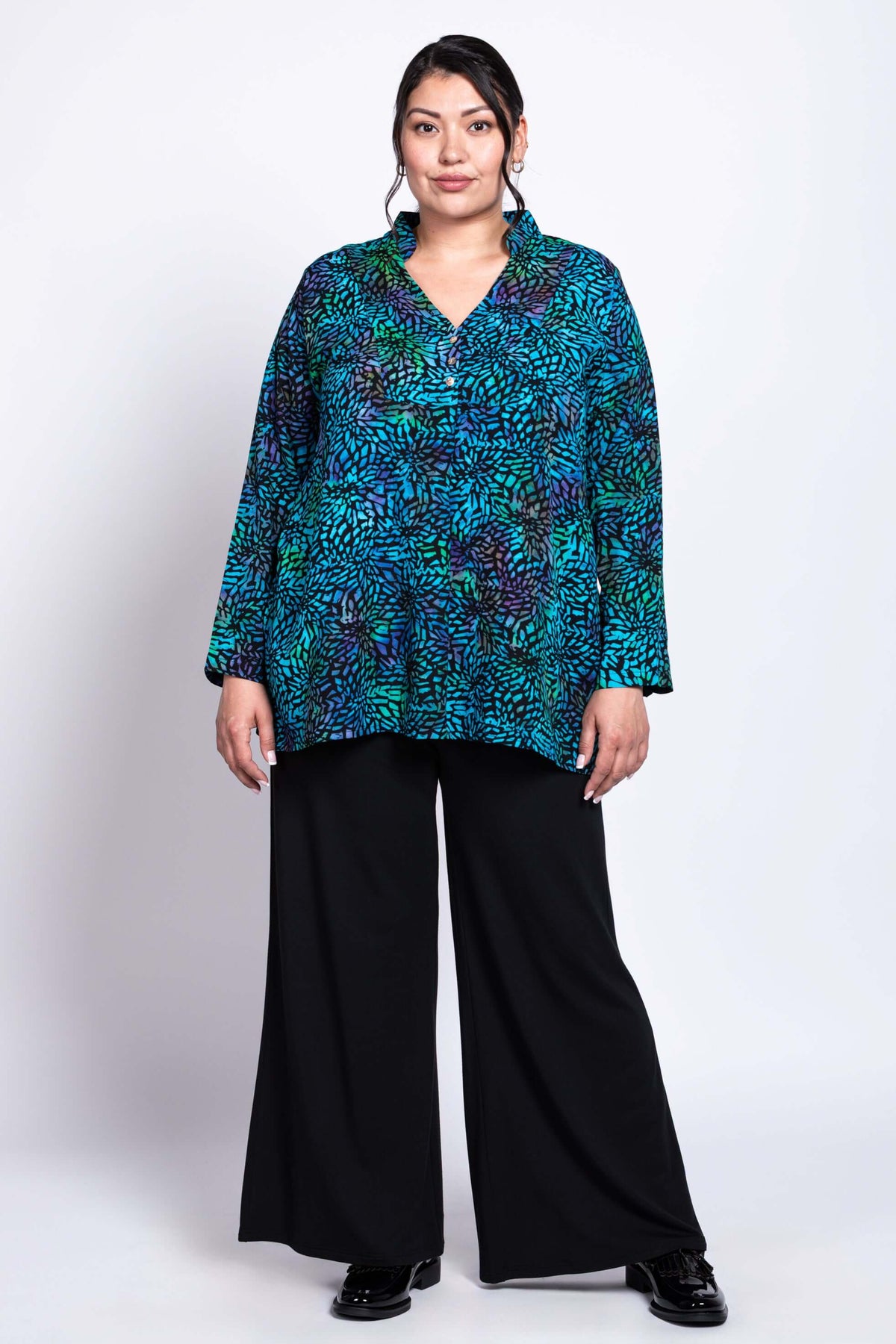 Full body view of model in Shirley Blouse and black wide-leg pants