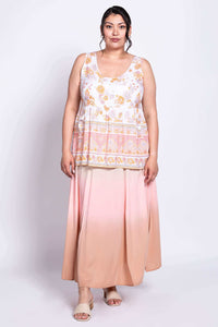 Full body view of model wearing Kaya Floral Tiered Tank Top with ombre skirt