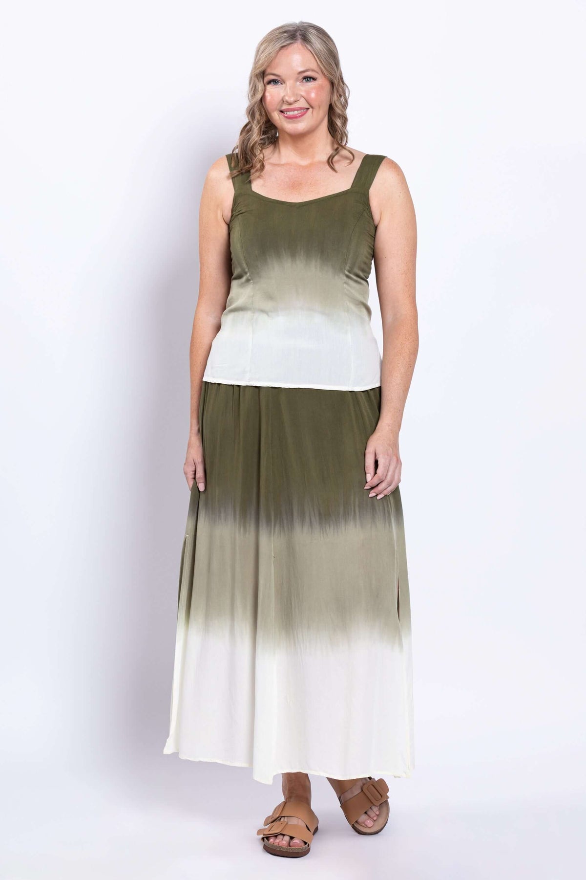 Full body front view of woman in olive ombre sleeveless tank top and matching skirt