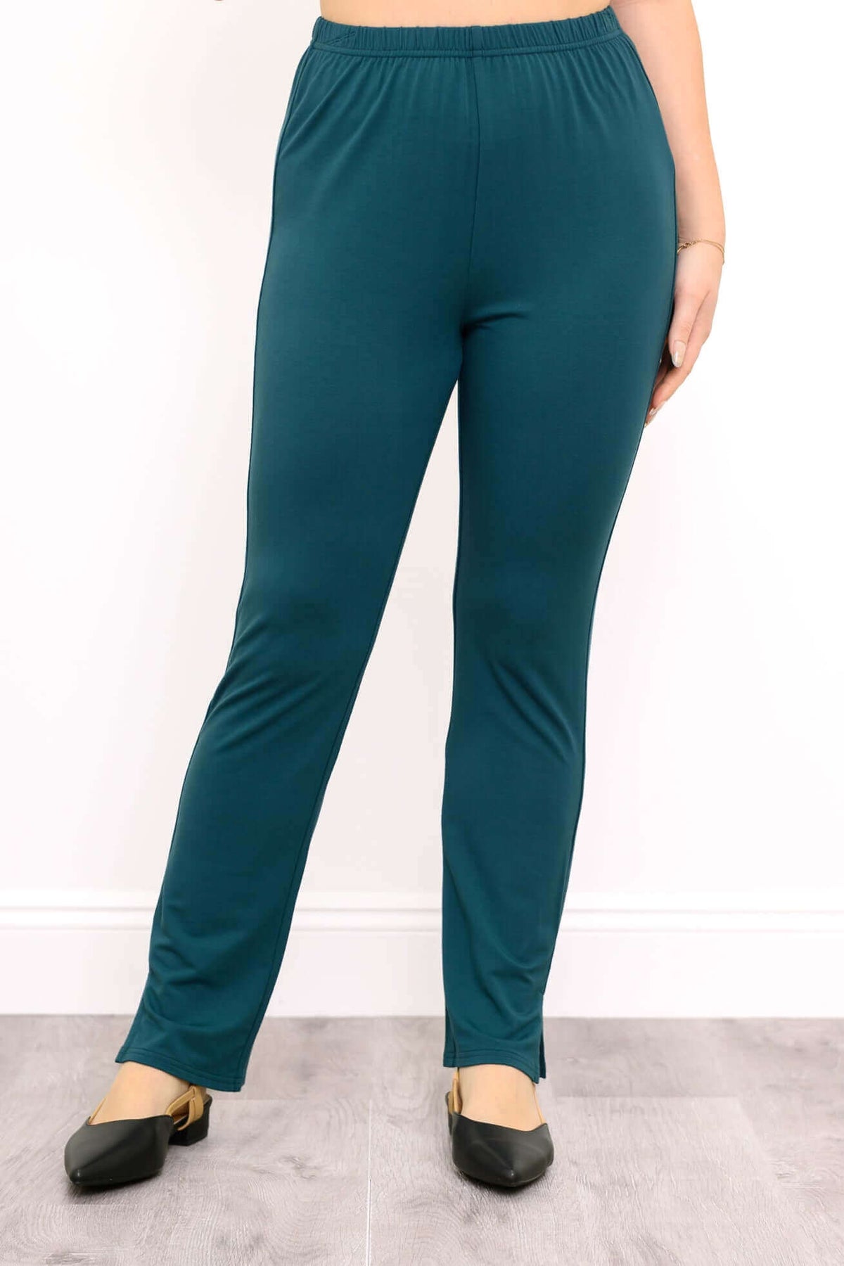 Full front view of Sarina Pant in teal with black flats