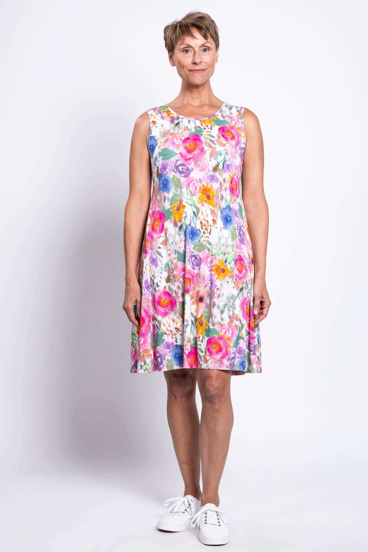 Full front view of woman modeling colorful floral Willow Dress