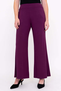 Full front view of purple wide leg pants worn with black heels