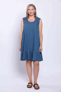 Full front view of sleeveless blue dress with round neck and ruffle hem