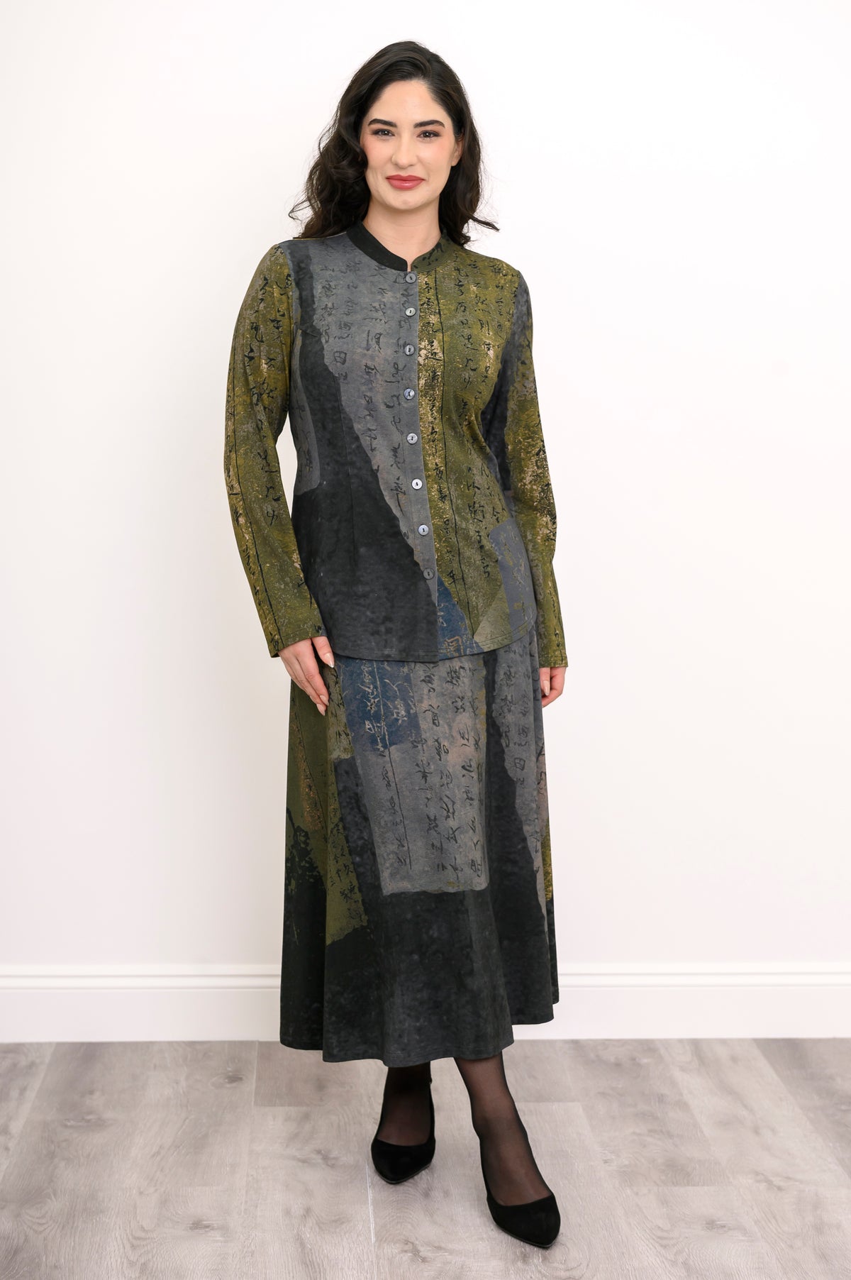 Two-piece coordinated bamboo knit outfit featuring a printed top and matching midi skirt, front-facing view.