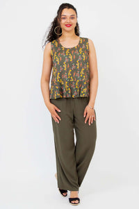 Model standing straight in Ginny Tank and olive wide-leg pants, front view