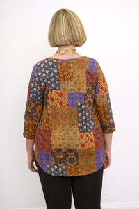Back view of a yellow patchwork bamboo top showing the relaxed fit and hip-covering hemline length.