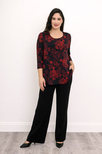 Slightly turned view of a crimson floral bamboo-cotton shirt on a model, highlighting a comfortable drape.