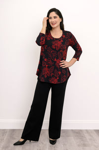Front view of a patterned black and red knit tunic with 3/4 sleeves, showcasing a loose, flattering drape.