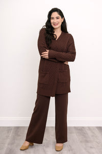 A versatile women's winter fashion layering piece featuring a structured dark brown cable knit top.