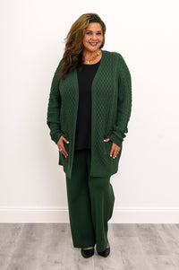 Comfortable forest green cable knit long sleeve cardigan top for a cozy winter outfit look.