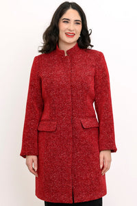Woman wearing red collared coat with pockets and a black skirt on a white background, front view
