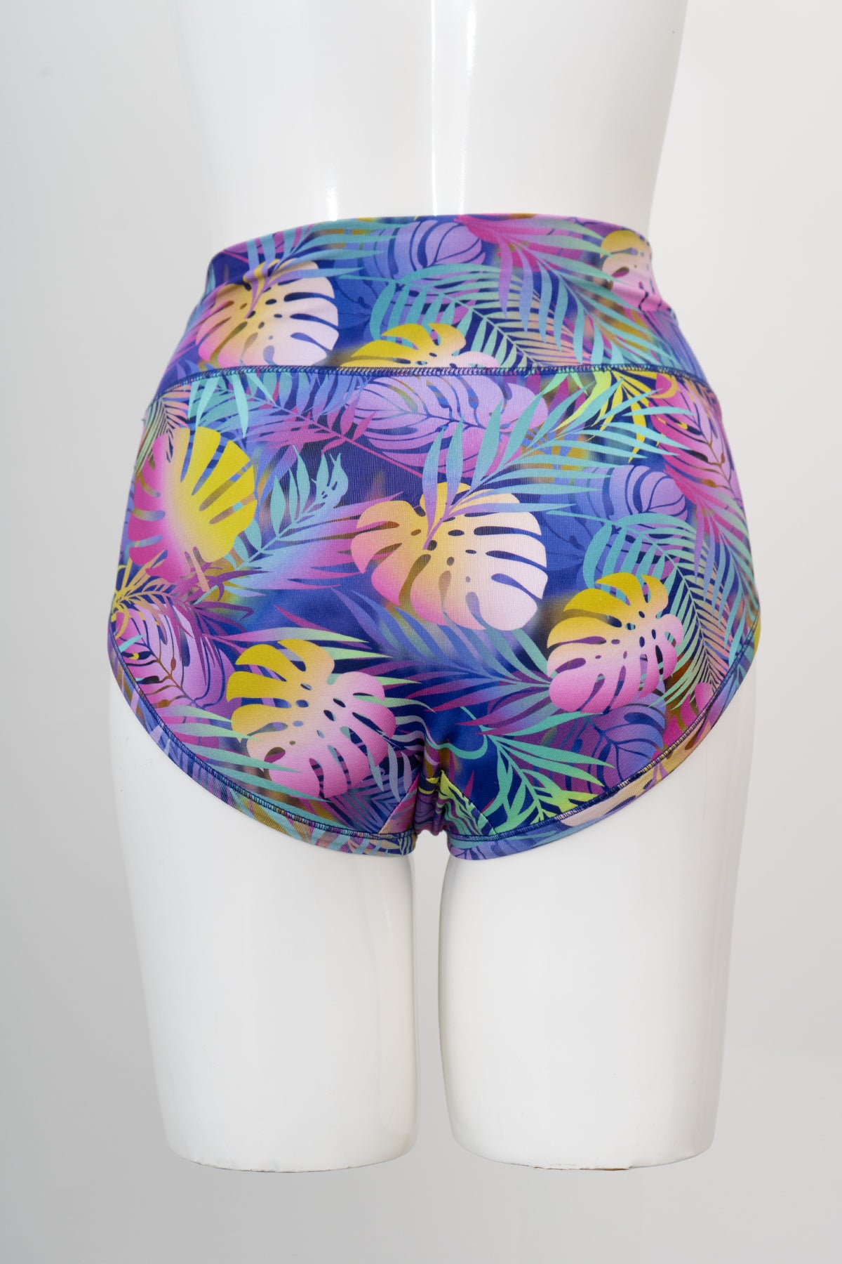 back view of multicolour leaf tropical leaf patterned high waist women's underwear on a white background