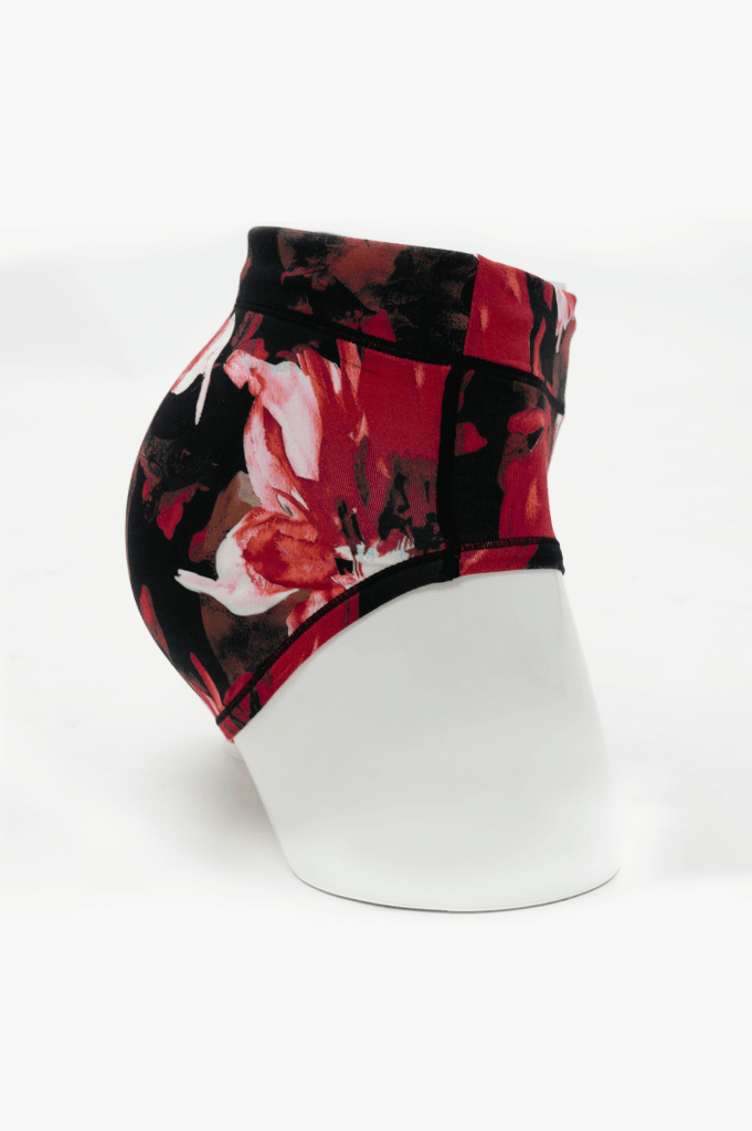 Side view of La Gaunche Brief in bold floral skull pattern displayed on mannequin
