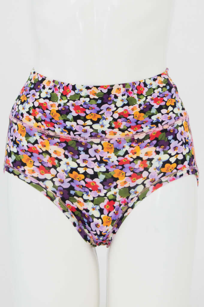 Front view of La Gaunche classic high-waist brief in colorful floral print