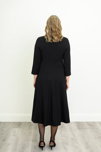 Black A-line midi dress with hidden pockets made from comfortable bamboo French terry fabric