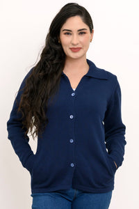 Studio portrait showcasing a dark blue long sleeve knit sweater with a classic collar.