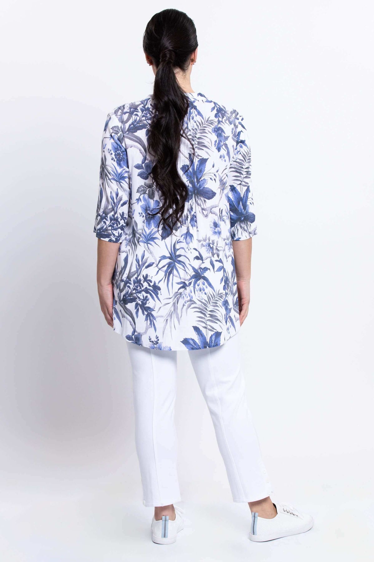 Back view of Margate blouse highlighting blue floral print and relaxed fit
