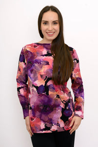 Women's relaxed boat neck pullover in a vibrant magenta leaf print, styled against a simple white background.