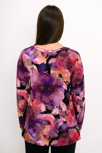 Back view of a magenta floral print bamboo top showing the loose, straight-cut hemline and comfortable drape.