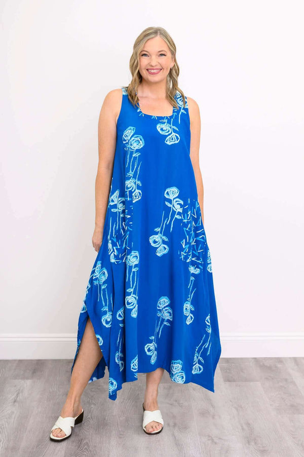 Front view of woman wearing Maria Dress in blue with white botanical print