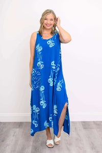 Front view of Maria Dress blue botanical print, model smiling
