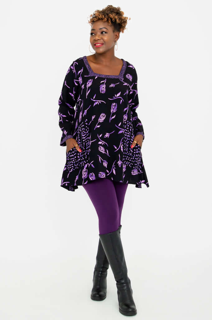 Three-quarter front view of Maria Tunic styled with leggings and boots