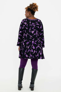 Back view of Maria Tunic displaying allover violet rose print and contrast neckline