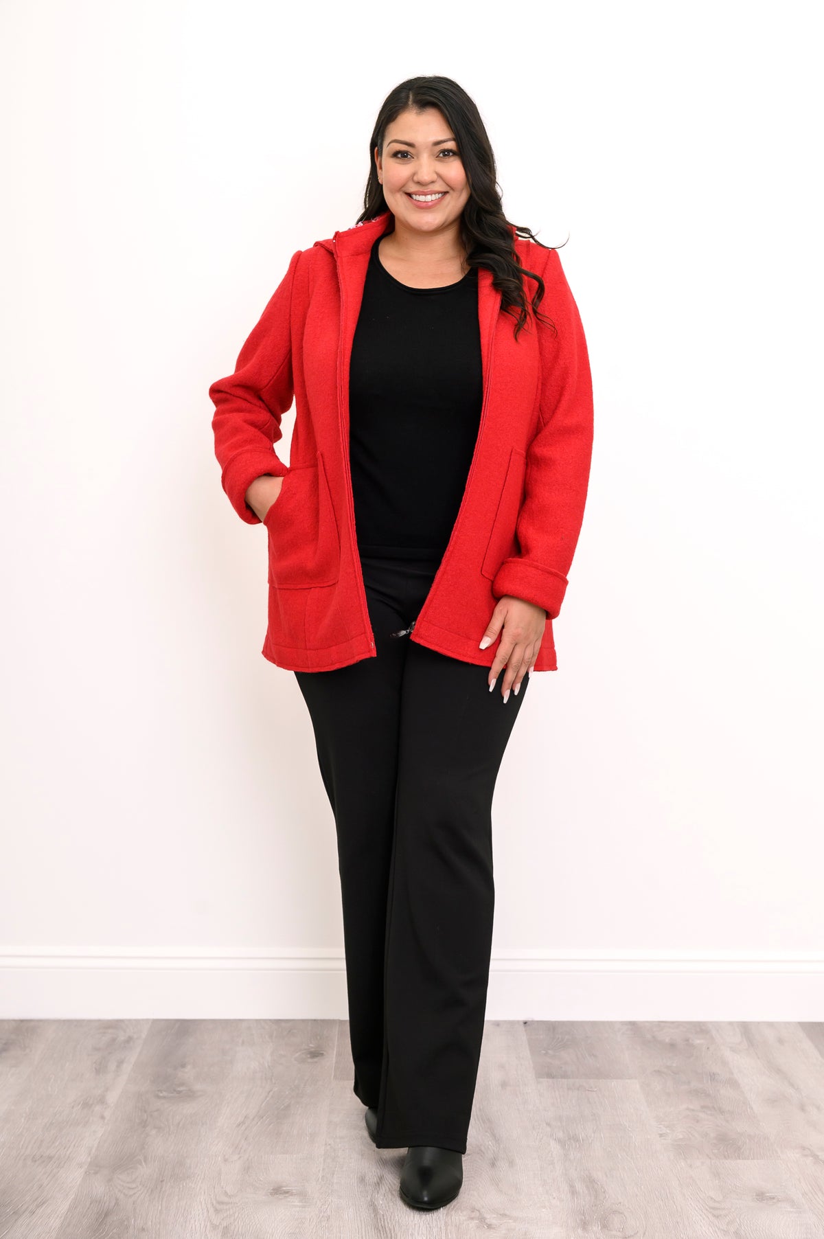 full body view of model in straight fit boiled wool jacket in bright red