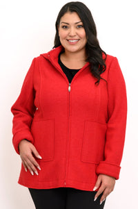 Woman wearing hip-length red zippered coat with hood and black pants on a white background, front view