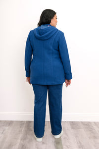 Back view of woman wearing cobalt blue jacket with hood and curved silouehette 