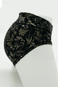Side view of Meadow Black Hipster underwear highlighting floral print and fit