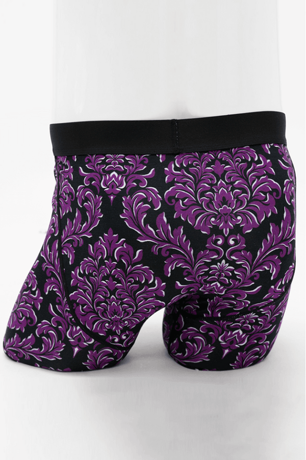 Rear view of Middle Man bamboo boxer briefs with a purple baroque pattern and solid black waistband