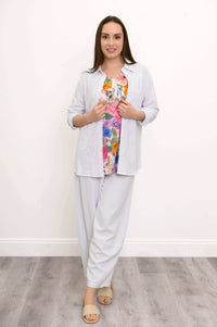 Model front view wearing Boardwalk Crop Pants, white shirt, and floral top