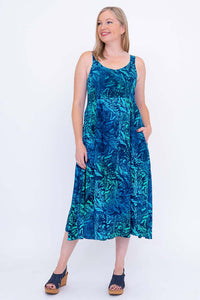 Woman modeling Shauna ocean wave dress with hand in pocket