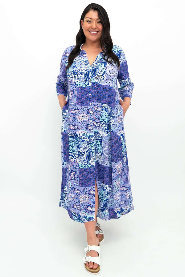 Model wearing a blue and purple paisley print bamboo linen maxi shirt dress