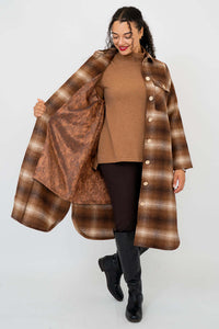 Model showing inside paisley lining of the brown plaid wool-blend coat