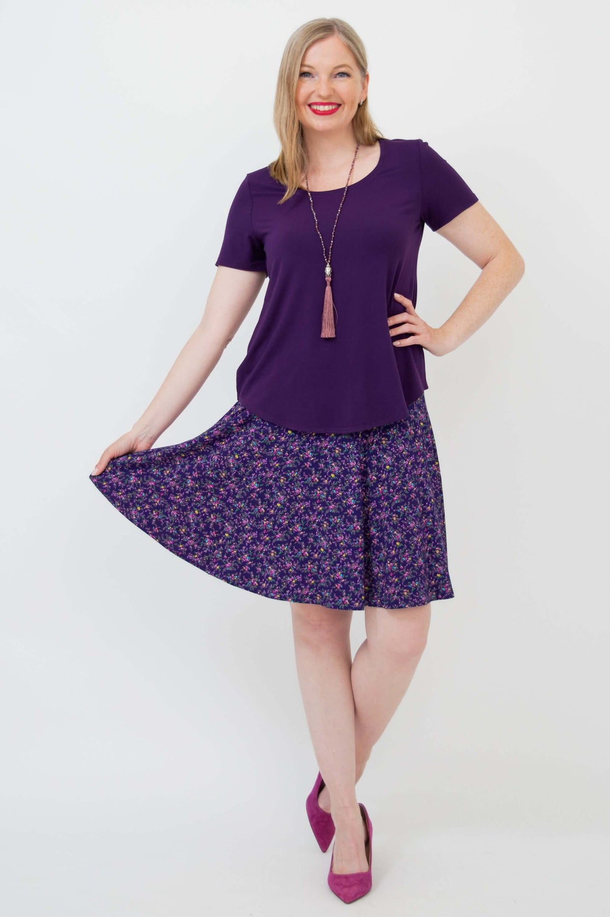 Model wearing Aly Skirt in Violet Meadow floral print