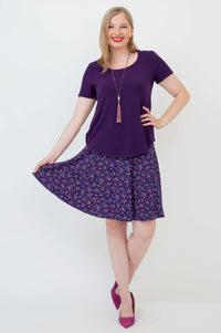 Model wearing Aly Skirt in Violet Meadow floral print
