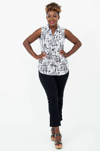 Full body view of model in Hula quarter zip tank and black pants