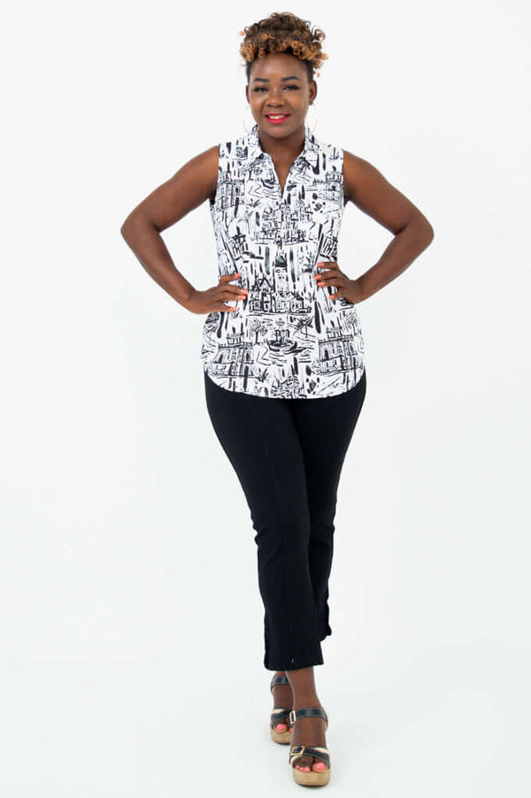 Full body view of model in Hula quarter zip tank and black pants
