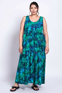 Model displaying the Kayana dress with relaxed fit and tiered skirt
